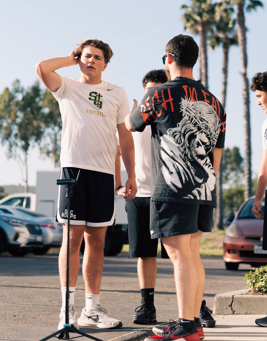 Athletes waiting their turn at an outdoor timed sprint session